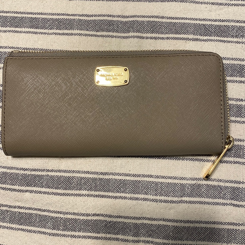 Lightly used Michael Kors taupe wallet, gold accents